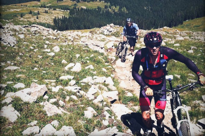 Hike-a-biking towards Searle Pass